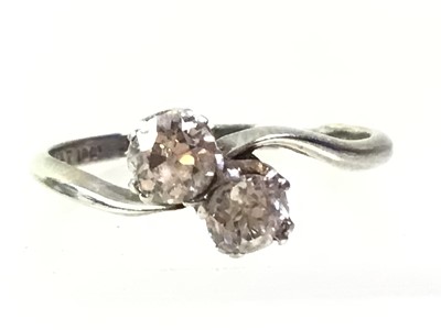 Lot 297 - TWO STONE DIAMOND TWIST RING