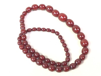 Lot 482 - CHERRY AMBER BAKELITE NECKLACE