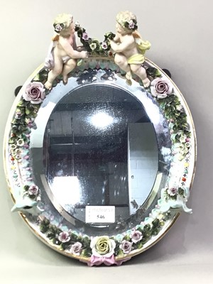 Lot 546 - SMALL OVAL BEVELLED WALL MIRROR