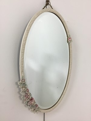 Lot 549 - SHIELD SHAPED BEVELLED WALL MIRROR