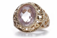 Lot 342 - ROSE GOLD GEM AND DIAMOND RING set with a...