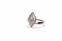 Lot 390 - MARQUISE DIAMOND DRESS RING set with a central...