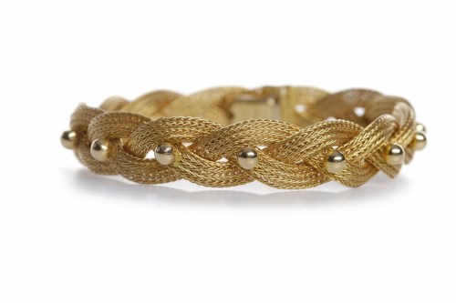 Lot 417 - EIGHTEEN CARAT GOLD PLAITED BRACELET formed by...