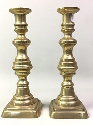 Lot 337 - PAIR OF BRASS EJECTOR TABLE CANDLESTICKS