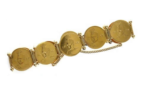 Lot 518 - PERSIAN COIN BRACELET formed by eight coins...