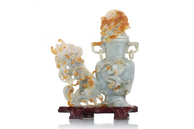 Lot 1538 - CHINESE PALE GREEN AND RUSSET JADE CARVING