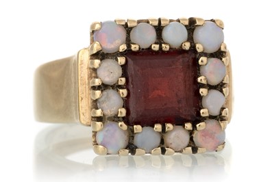 Lot 482 - GARNET AND OPAL RING