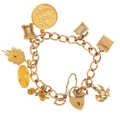 Lot 484 - GOLD CHARM BRACELET