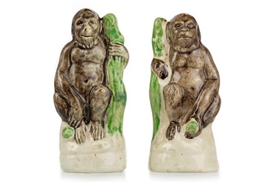 Lot 1284 - TWO STAFFORDSHIRE STYLE POTTERY GORILLAS