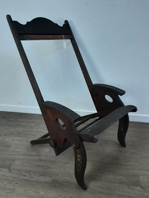 Lot 488 - IN THE MANNER OF HERBERT MCNAIR, OAK CAMPAIGN CHAIR