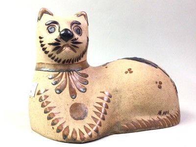 Lot 208 - ART POTTERY FIGURE OF A RECUMBENT CAT