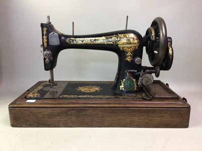 Lot 349 - FOUR VICTORIAN PORTABLE HAND SEWING MACHINES