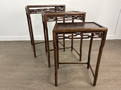 Lot 1626 - CHINESE PADOUK NEST OF THREE TABLES