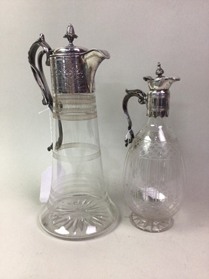 Lot 550 - TWO VICTORIAN GLASS CLARET JUGS