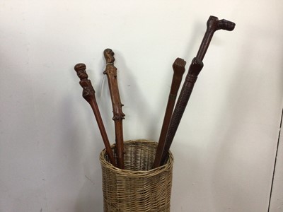 Lot 566 - FIVE VINTAGE CARVED WALKING STICKS