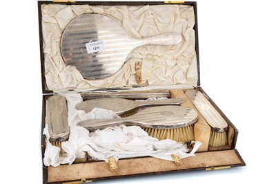 Lot 1259 - GEORGE V SILVER DRESSING TABLE SET