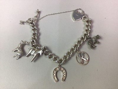 Lot 619 - SILVER CHARM BRACELET