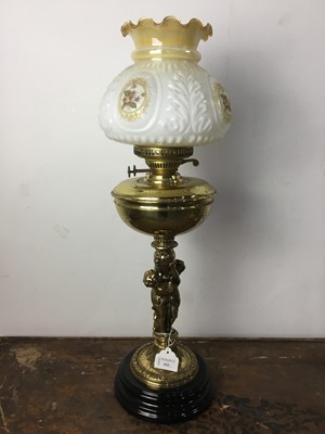 Lot 432 - THREE BRASS OIL LAMPS