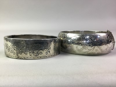 Lot 691 - TWO SILVER BANGLES