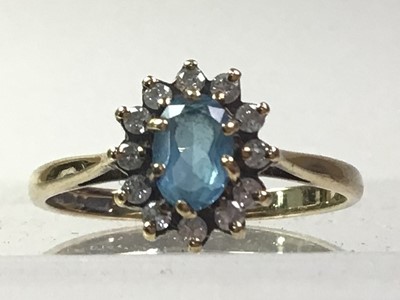 Lot 709 - TOPAZ CLUSTER RING