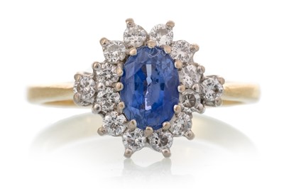 Lot 593 - SAPPHIRE AND DIAMOND CLUSTER RING