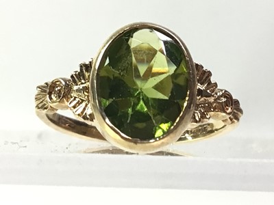 Lot 3 - THREE PERIDOT RINGS