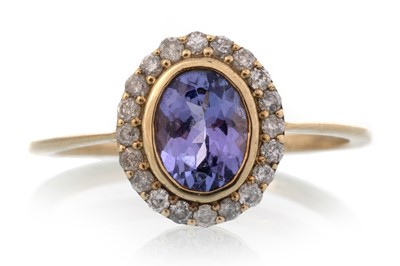 Lot 609 - TANZANITE AND DIAMOND RING