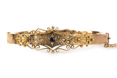 Lot 611 - EDWARDIAN SAPPHIRE AND SEED PEARL BANGLE