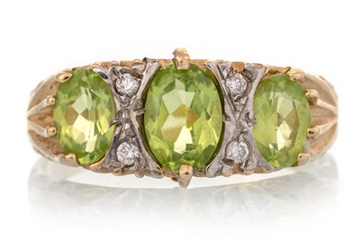 Lot 494 - PERIDOT AND DIAMOND BOAT RING