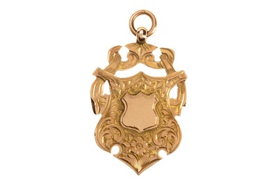 Lot 649 - NINE CARAT GOLD MEDAL