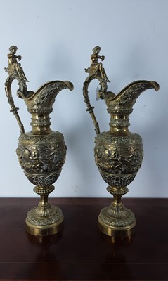 Lot 1373 - PAIR OF BRASS EWER ORNAMENTS