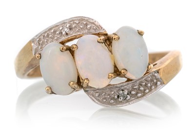 Lot 696 - OPAL THREE STONE RING