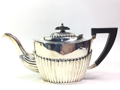 Lot 630 - GEORGE V SILVER TEAPOT