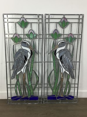 Lot 644 - PAIR OF STAINED AND LEADED GLASS WINDOWS