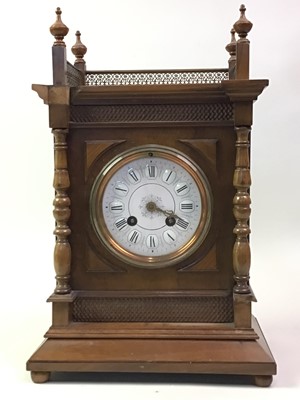 Lot 501 - WALNUT MANTEL CLOCK