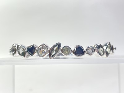 Lot 738 - GROUP OF SILVER AND OTHER BANGLES