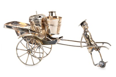 Lot 847 - WHITE METAL RICKSHAW CRUET SET