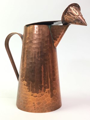 Lot 825 - ARTS & CRAFTS HAMMERED COPPER JUG