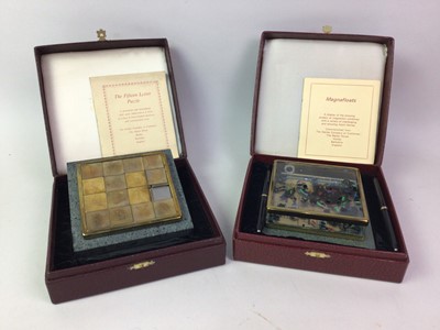 Lot 334 - TWO HENLEY COMPANY PRESENTATION PUZZLES