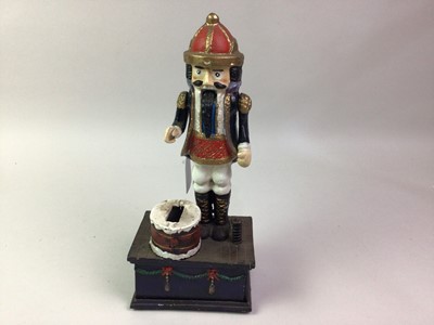 Lot 216 - NOVELTY CAST METAL NUTCRACKER FIGURE MONEY BANK