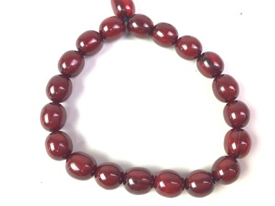 Lot 189 - CHERRY AMBER BAKELITE NECKLACE