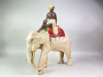 Lot 308 - PAINTED STUCCO FIGURE