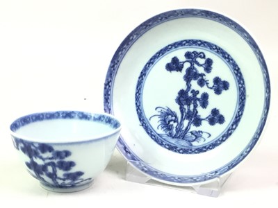 Lot 402 - CHINESE BLUE AND WHITE TEA BOWL AND SAUCER