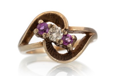 Lot 467 - PINK SAPPHIRE AND DIAMOND THREE STONE RING