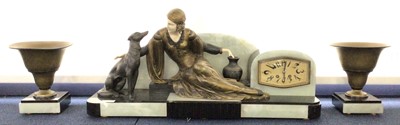 Lot 481 - MENNEVILLE - UGO CIPRIANI (FRENCH, 1897 - 1960), ART DECO BRONZE AND SPELTER CLOCK GARNITURE