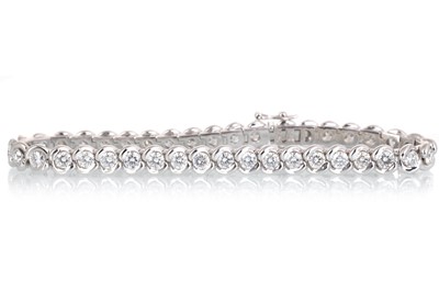 Lot 444 - DIAMOND TENNIS BRACELET