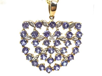 Lot 37 - TANZANITE AND DIAMOND PENDANT