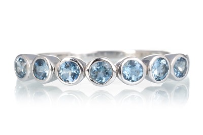 Lot 464 - AQUAMARINE HALF ETERNITY RING