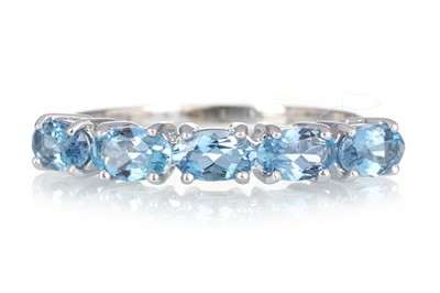 Lot 484 - AQUAMARINE HALF ETERNITY RING