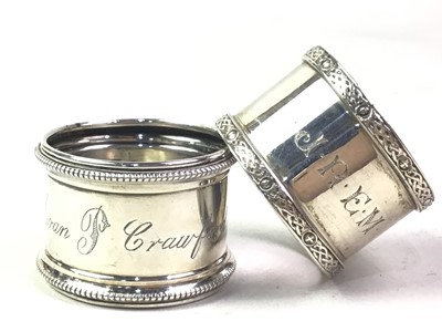 Lot 122 - FIVE SILVER NAPKIN RINGS